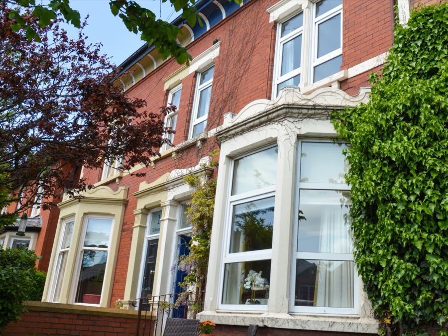 Exterior of Bluebell House care home, a red-brick Victorian house in Poulton-le-Fylde